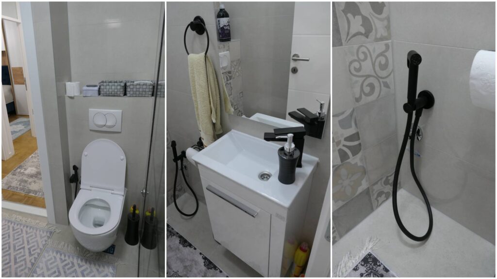 kupatilo sa ukrasnom keramikom i crnim detaljima